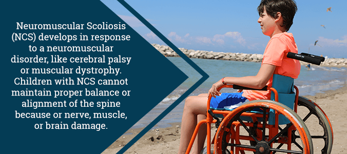 child with neuromuscular scoliosis at beach in wheelchair